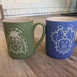 Disney Parks Minnie Mouse and Eeyore Coffee Mugs with raised pattern